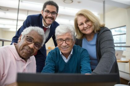 a group of people smiling while wearing eyeglasses